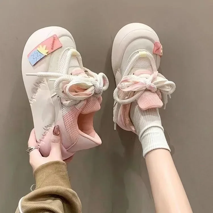 Primavera nuevo diseño lindo sentido cabeza redonda zapatillas casuales mujeres cómodos encantadores zapatos de pan mujeres