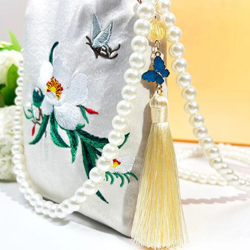 Torebka damska w stylu vintage z uchwytem górnym, klasyczna czekoladowo-brązowa torba crossbody z łańcuszkiem, frędzlami i ozdobnymi chwostami.