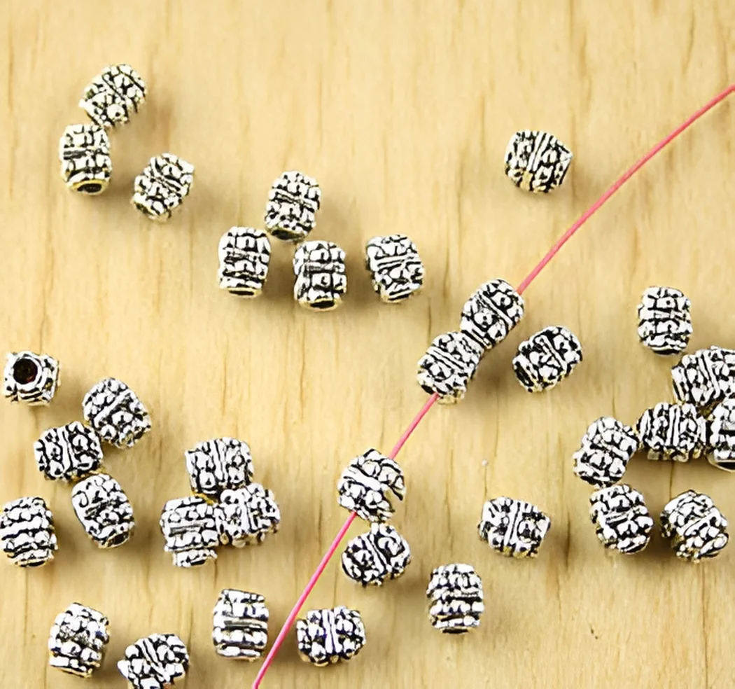 

80pcs 4*3mm Alloy matel tibetan silver studded beads HWH1681