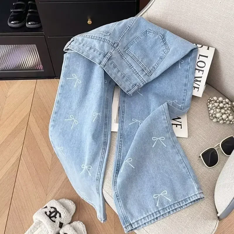 جينز تنحيف عالي الخصر للنساء صيفي وصل حديثًا سروال مستقيم الساق حار حلو طويل الطول تصميم عصري