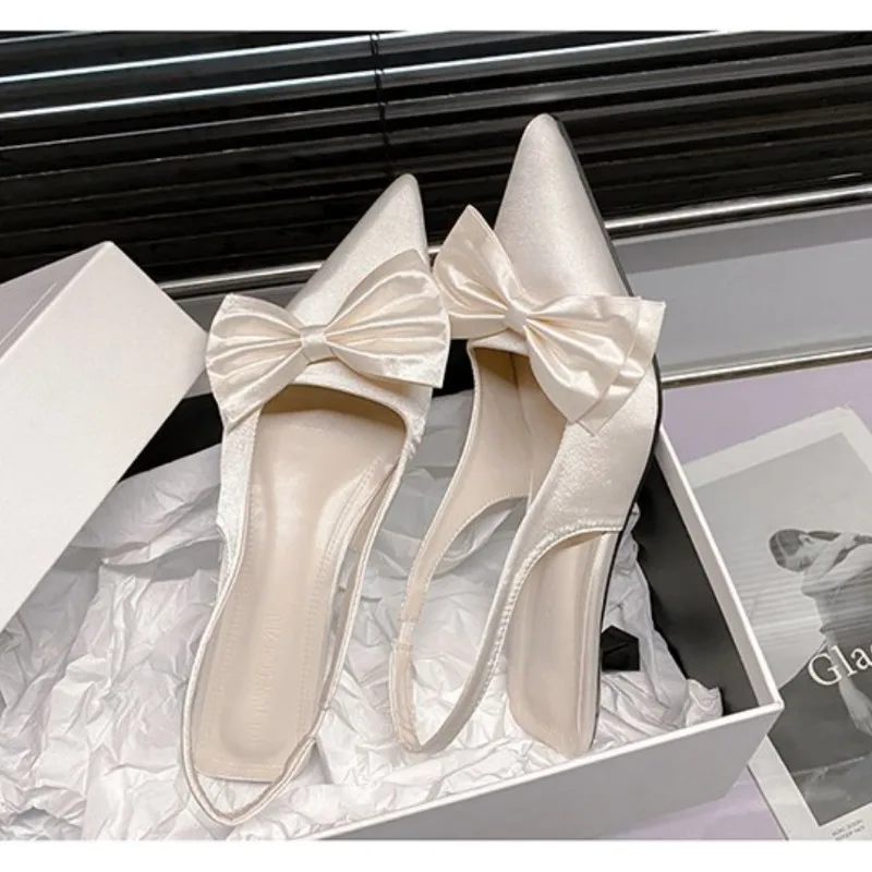 Sandalias de mujer con lazo puntiagudo, moda Sexy de verano 2025, nuevas sandalias de tacón de aguja de talla grande, zapatillas de tacón alto, sandalias de vestir de diseñador