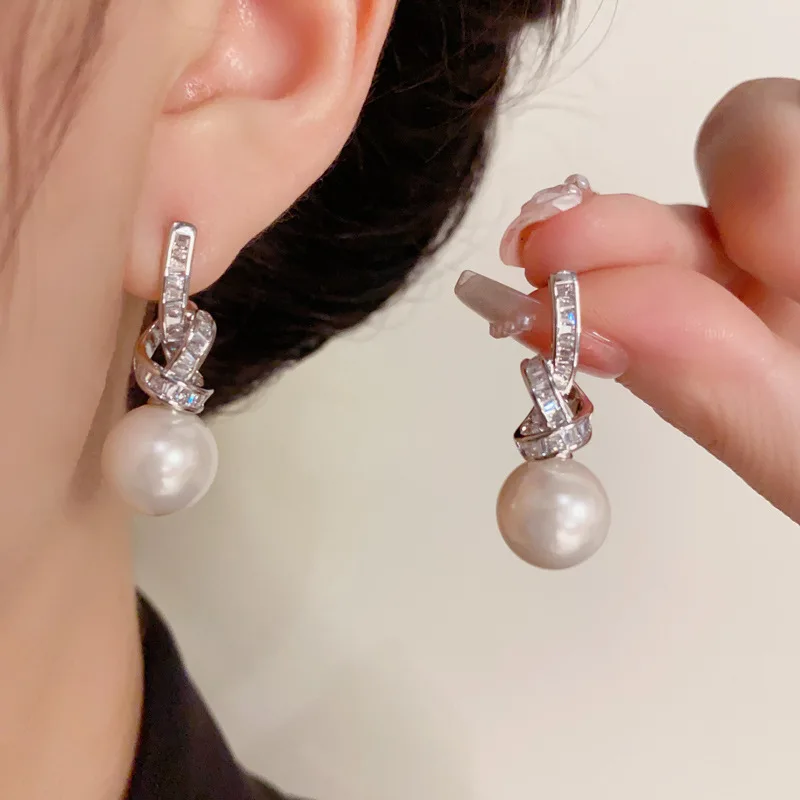 Light Luxury Micro Inlaid Zircon Knotted Pearl 925 Silver Needle Exquisite and Fashionable Super Sparkling Earrings