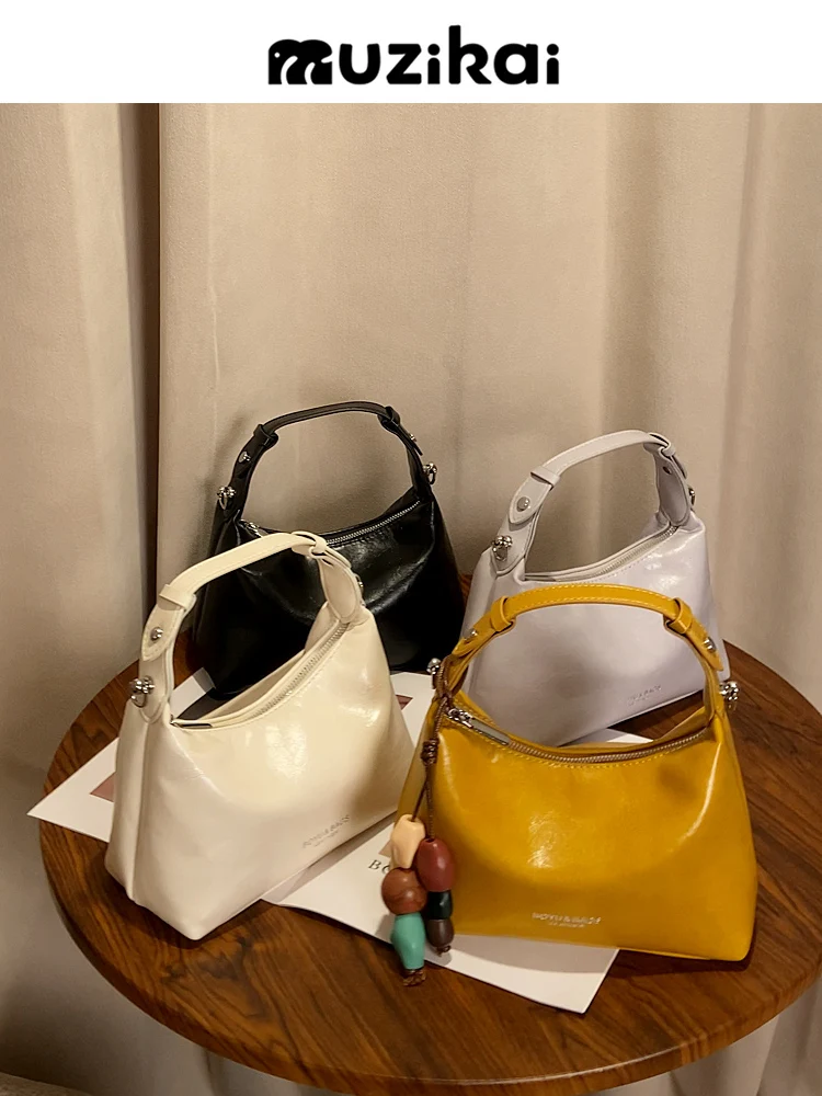 Soft Leather Crossbody Pillow Bag Women's Handbag MuziKai New 2026 Trendy Minimalist Feel Detachable Shoulder Strap