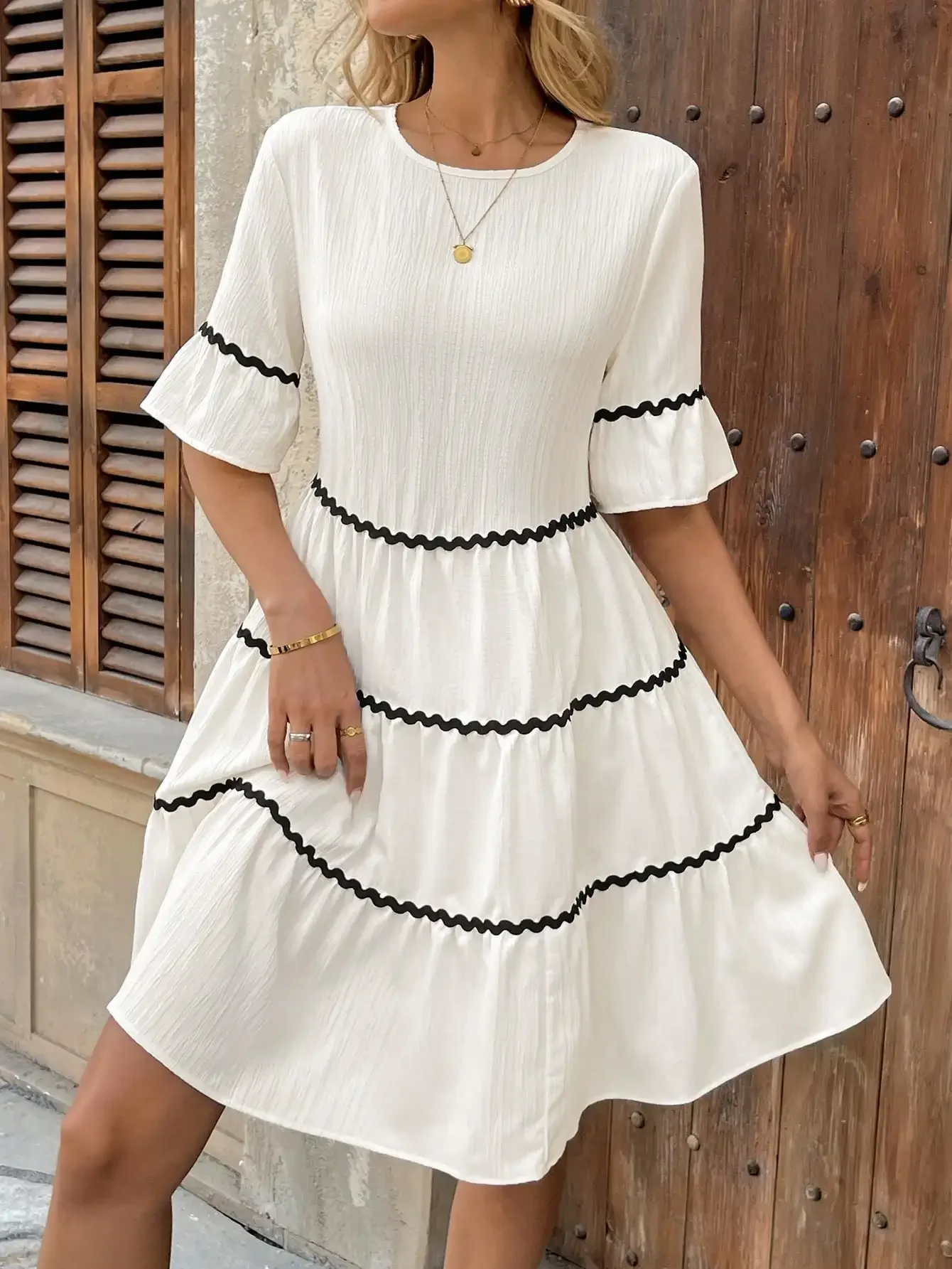 Nice Leisure and vacation style round neck ruffle short sleeve wavy webbing sticker contrast woven fabric apricot summer women
