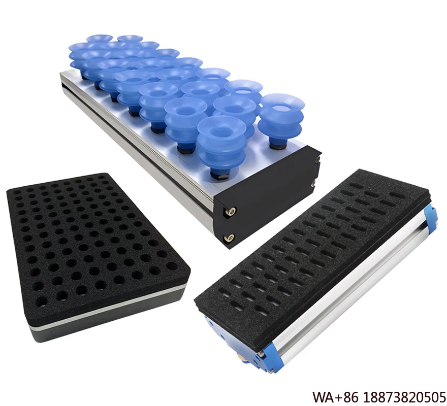 O braço do robô parte as ventosas a vácuo para manuseio e paletização