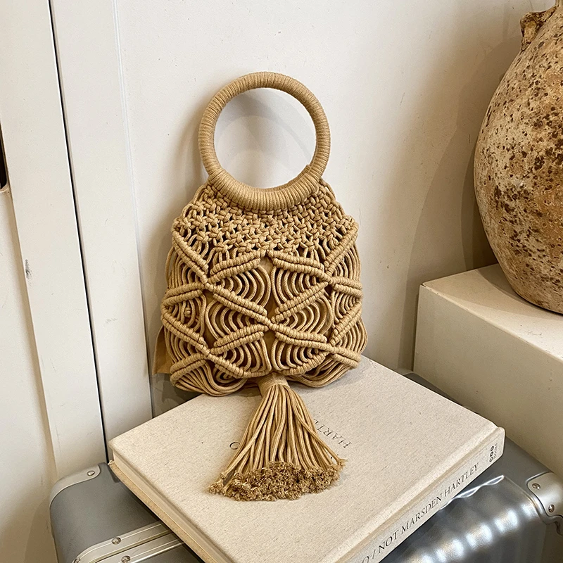 

2026 New Casual Boho Handmade Macrame Bucket Bag for Women Woven Tassel Top Handle Bag Summer Beach Vacation Hollow Out Handbag