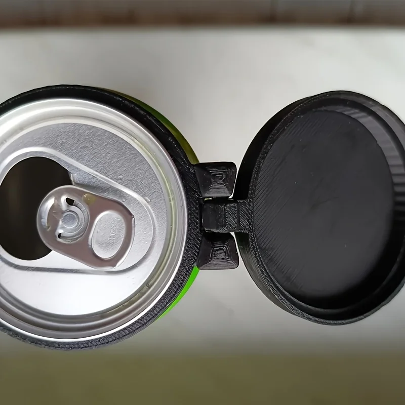 A protective cover used to protect canned beverage cans, which can be clipped onto the can opening