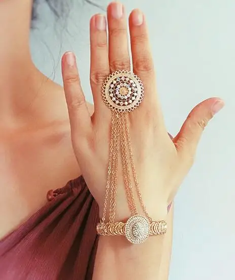 

Indian Greek Style Gold Bracelet With Finger Ring and Integrated Bracelet Back Chain