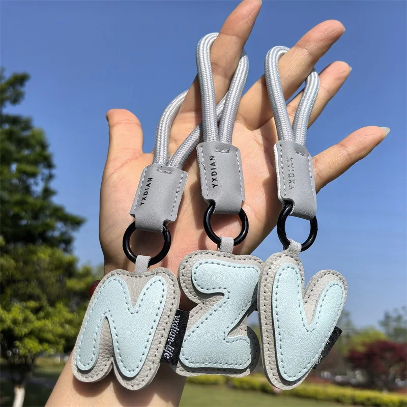 A To Z Leather Initials Keychain Braied Wristband Pendant Keyring for Women Men Car Bag Charms Camera Phone Case Accessories image 6