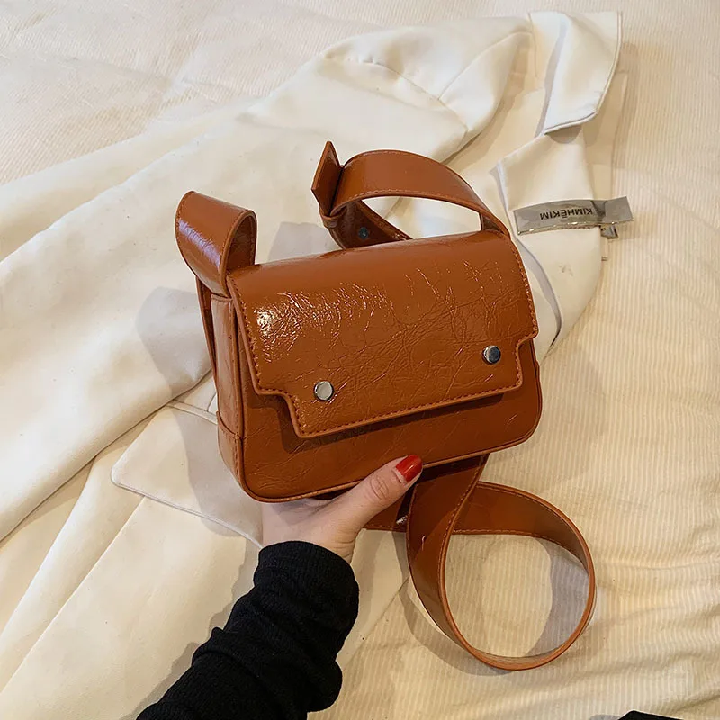 Kinder Umhängetaschen Herbst und Winter 2023 neue Retro Leder Jungen und Mädchen schöne Handy taschen Umhängetasche