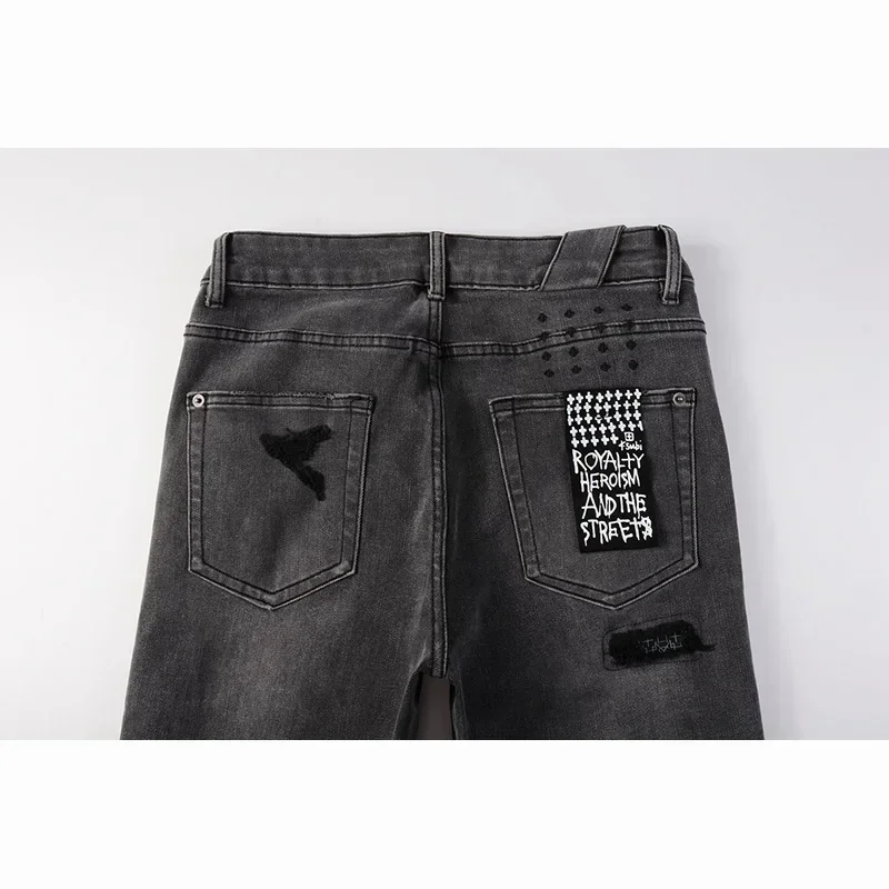 Pantaloni jeans strappati con bottoni di qualità con fori distrutti skinny elasticizzati grigio cenere effetto consumato High Street da uomo