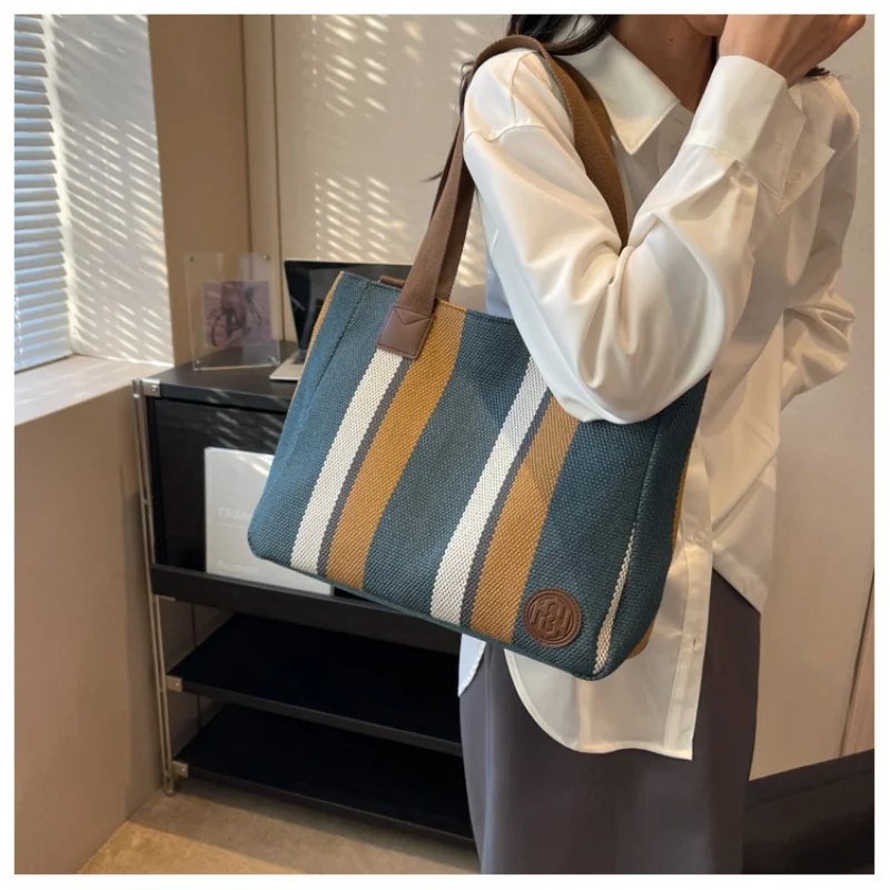 

2024 New Canvas Handbag with Advanced Sense, Practical Commuting Shoulder Bag, Large Capacity Tote Bag