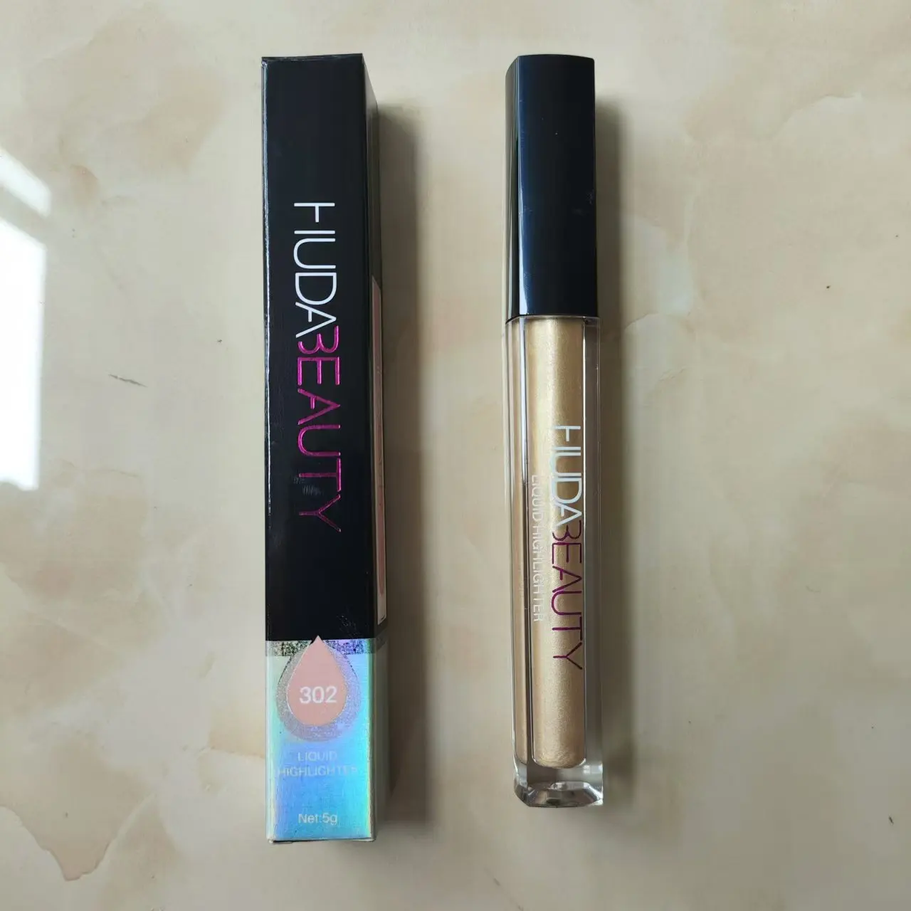 4-farbiger flüssiger Gesichts-Highlighter HUDA Stick Shimmer Shine High Lighter Iluminador Maquillaje Lidschatten Funkelnde Make-up-Kosmetik