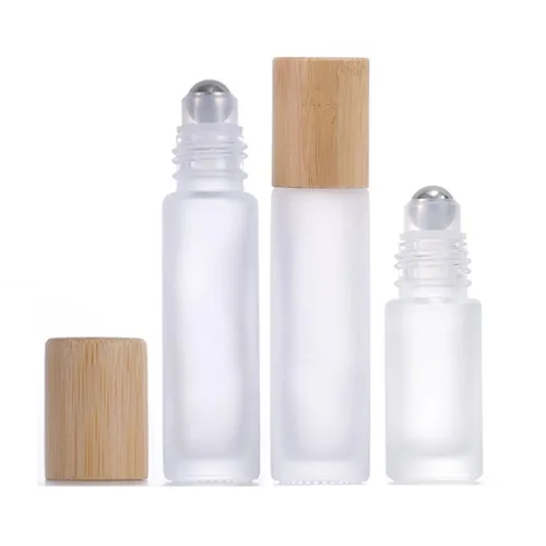 Imagen 2 del producto 12X 24X 5ML 10ML rollo de aceite esencial de vidrio en botellas tapa de madera de bambú Natural viales de Perfume bola de rodillo de acero recargable portátil