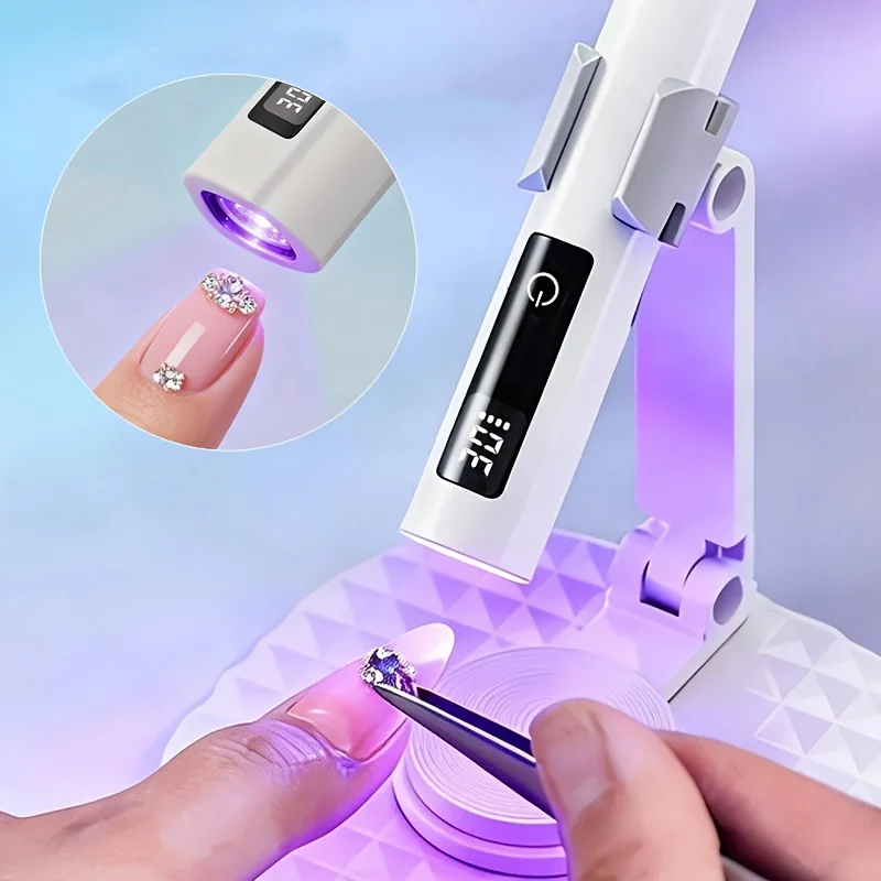 

Mini handheld LED display nail lamp, portable nail dryer with phone holder, stylish design, durable plastic material,