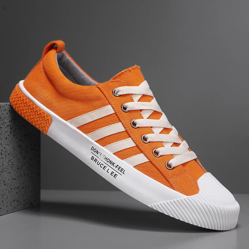 

Оригинальные легкие вулканизированные прогулочные повседневные туфли большого размера на плоской подошве с низким берцем и круглым носком с цветными блоками от мужского бренда для скейтбординга