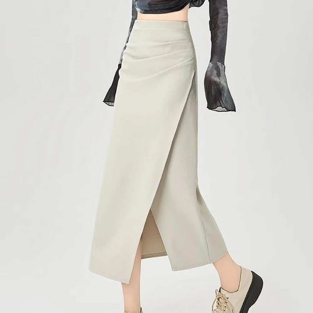 Hip-wrapped half-length dress women's autumn thin super-fire suit skirt 2025 new high-end exquisite split-ended one-step skirt