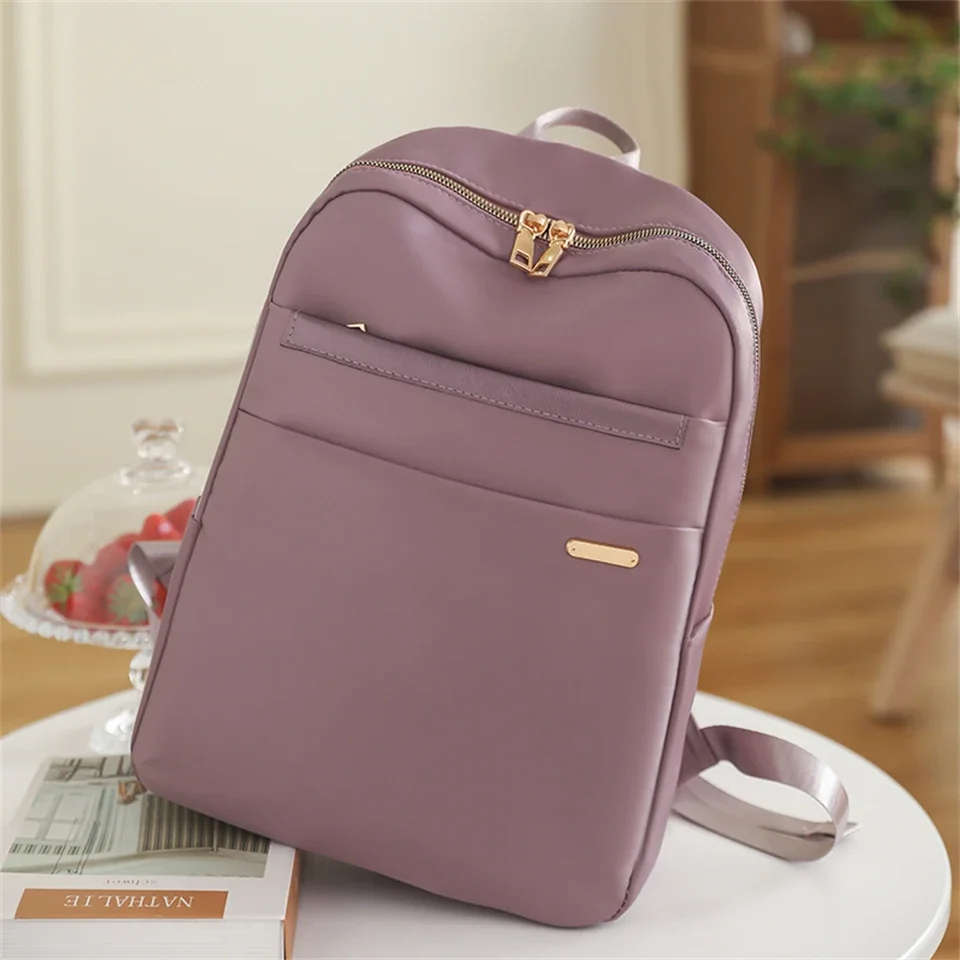 Mochila de nailon de diseño de lujo para mujer, morral escolar de estilo clásico a la moda para niñas, nuevas mochilas de viaje de alta capacidad