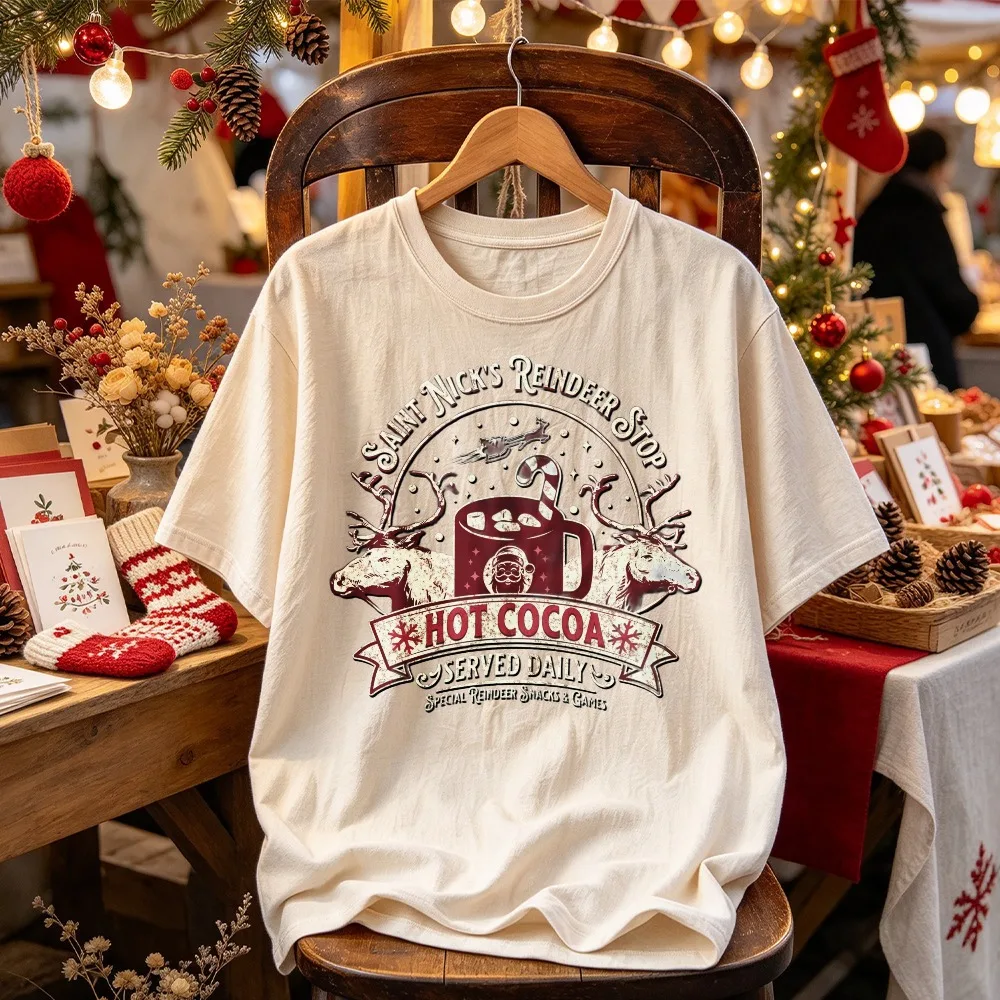 Saint Nick's Reindeer Stop Hot Cocoa Christmas Graphic Tshirt Vintage Reindeer Hot Chocolate Print Short Sleeve Xmas Holiday Tee