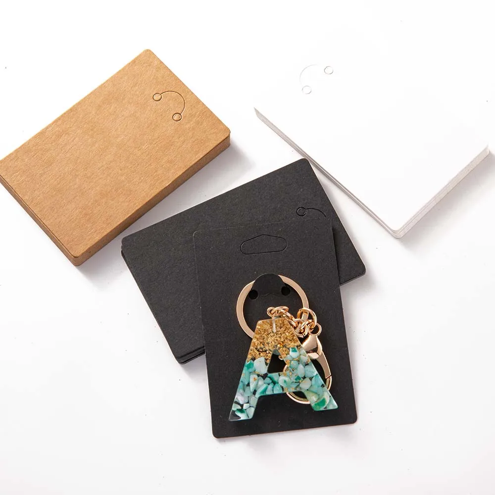50 قطعة 6x9 سنتيمتر المفاتيح عرض ورقة بطاقات حامل كرتون ل كيرينغ حامل مجوهرات التعبئة والتغليف الشركات الصغيرة لوازم المواد