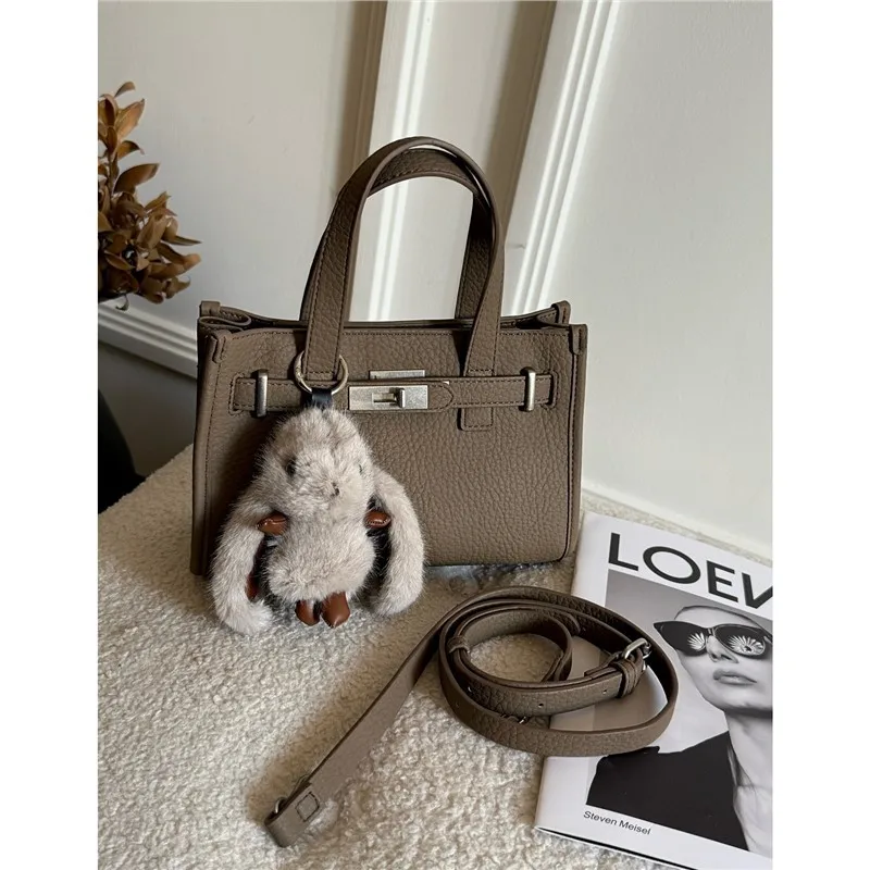 حقيبة كيلي جلدية منقوشة بالليتشي للنساء ذات إحساس عالٍ بالفخامة، حقيبة يد للتنقل، حقيبة كتف ساعي البريد، حقيبة حمل صغيرة