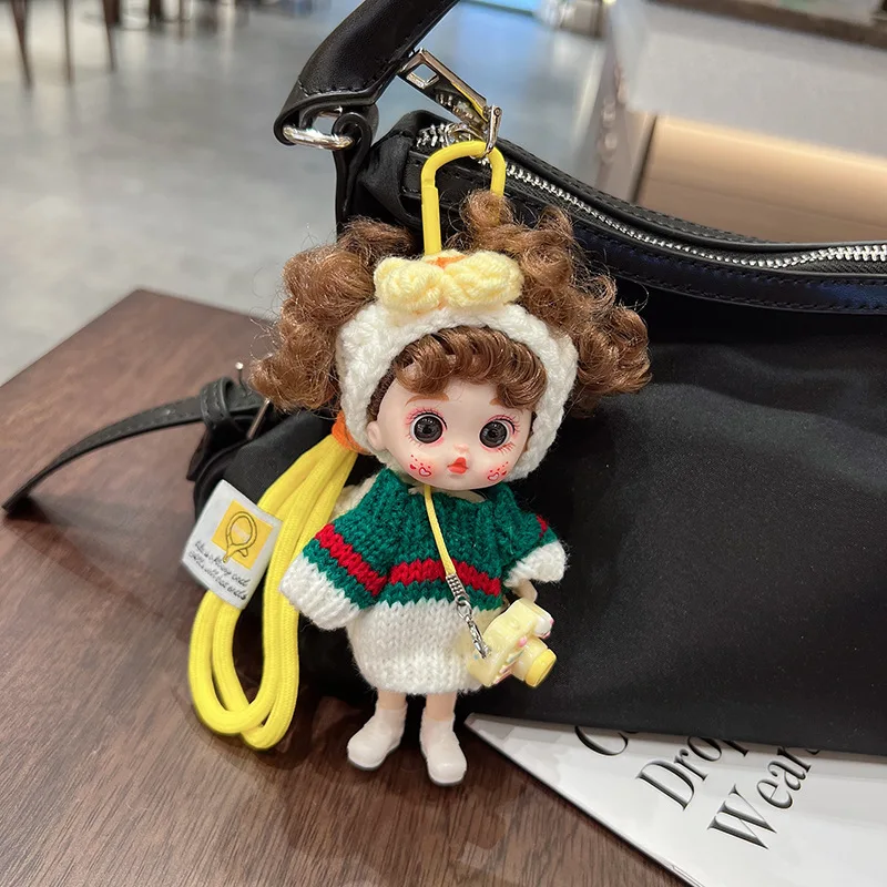 

Новая виниловая кукла 14,5 см: милый брелок-подвеска, модный джемпер, повязка на голову с бантом, мультяшная кукла-подвеска для сумки, брелок для автомобиля, подарок, детская игрушка