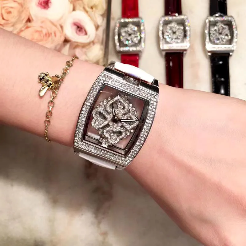 High Quality Luxury Quartz Watch with Rhinestone Spinning Diamond Face Fashion White Leather Tonneau Skeleton Watches for Women