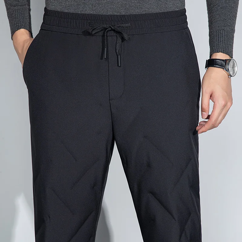 Pantalones ligeros y cálidos y cómodos de plumas de ganso para hombre, pantalones resistentes al viento y al frío, ropa térmica de ocio para invierno