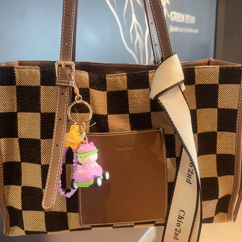 Neue grüne Frosch Kleinwagen Bumerang Schlüssel anhänger niedlichen Cartoon niedlichen Tier Puppe Tasche Rucksack Dekoration kleinen Anhänger kreative Geschenke