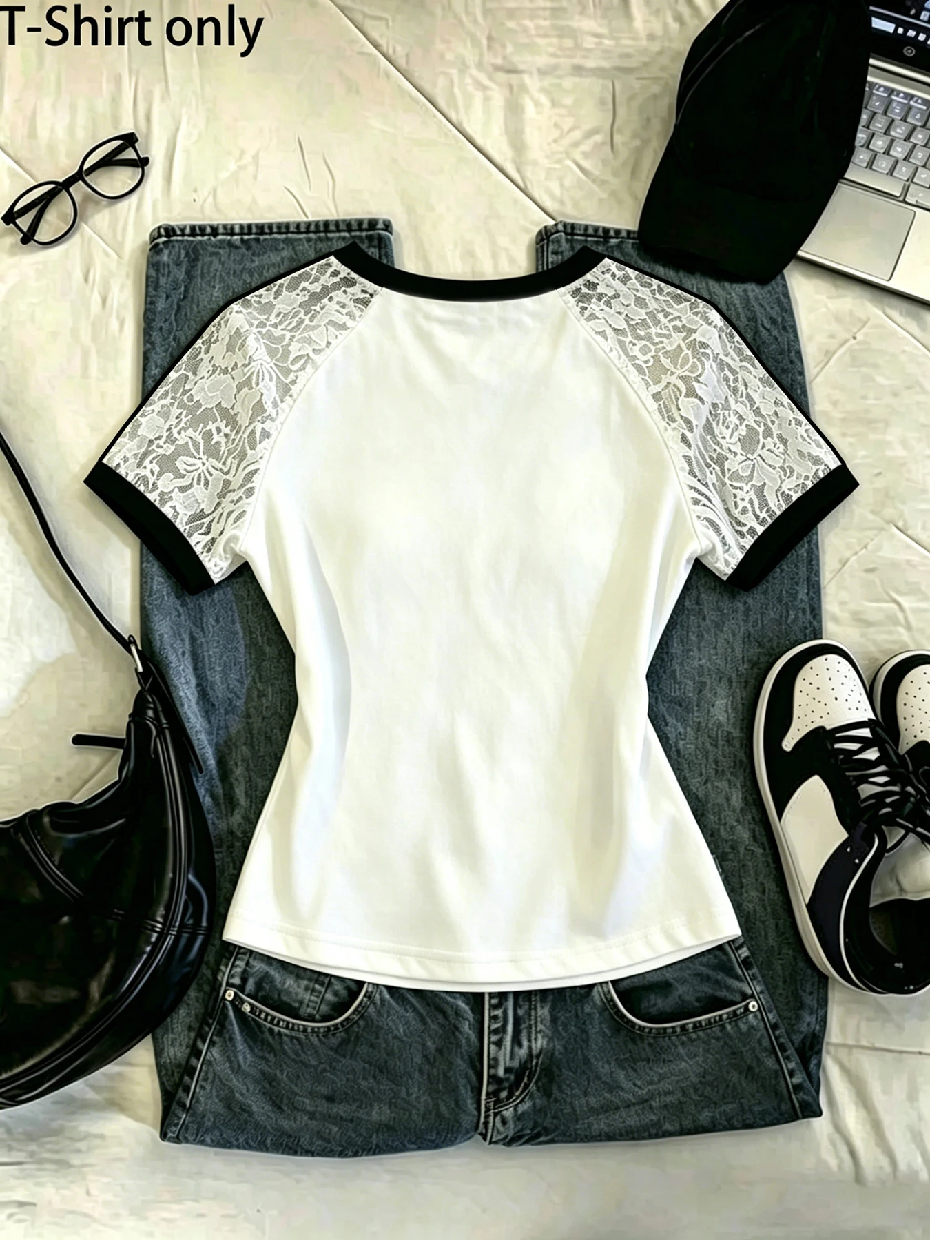 Women's white short-sleeved T-shirt with lace trim on the sleeves and embroidered cross pattern.