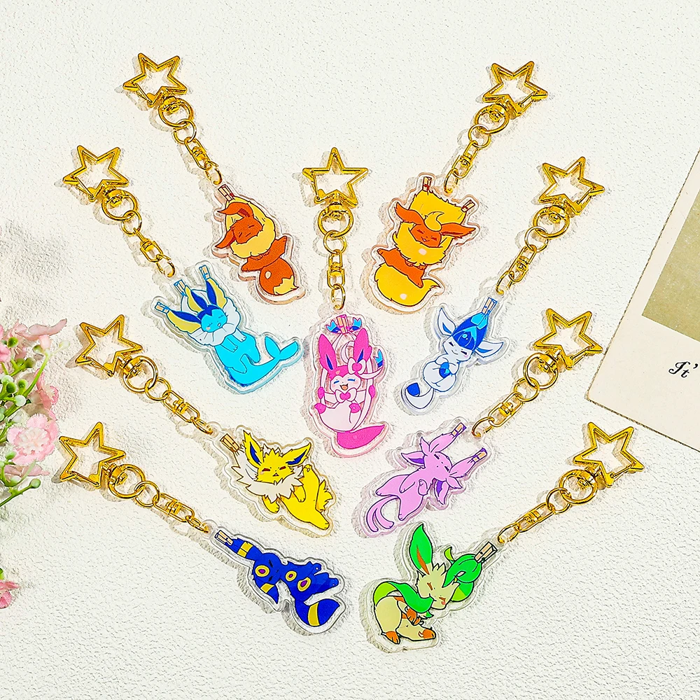 

Random 9PCS Cute Pokemon Eevee Evolutions Acrylic Keychains - Sylveon Jolteon Espeon Umbreon Leafeon Gold Star Char