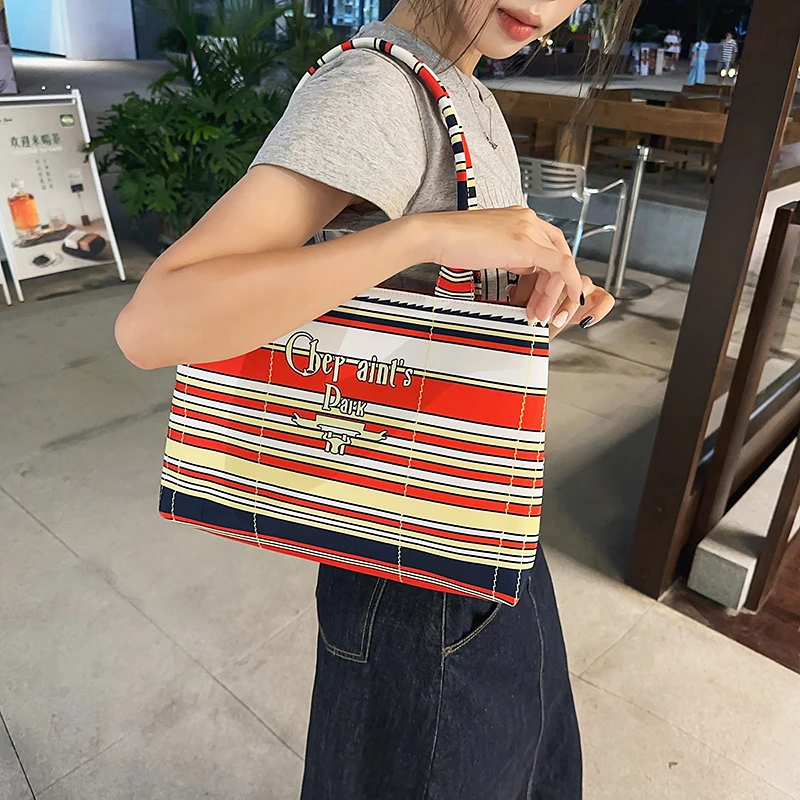 

Unique Leather Commuter Diaper Bag Large Capacity Stylish Crossbody Handbag For Women Minimalist Luxury Tote Messenger