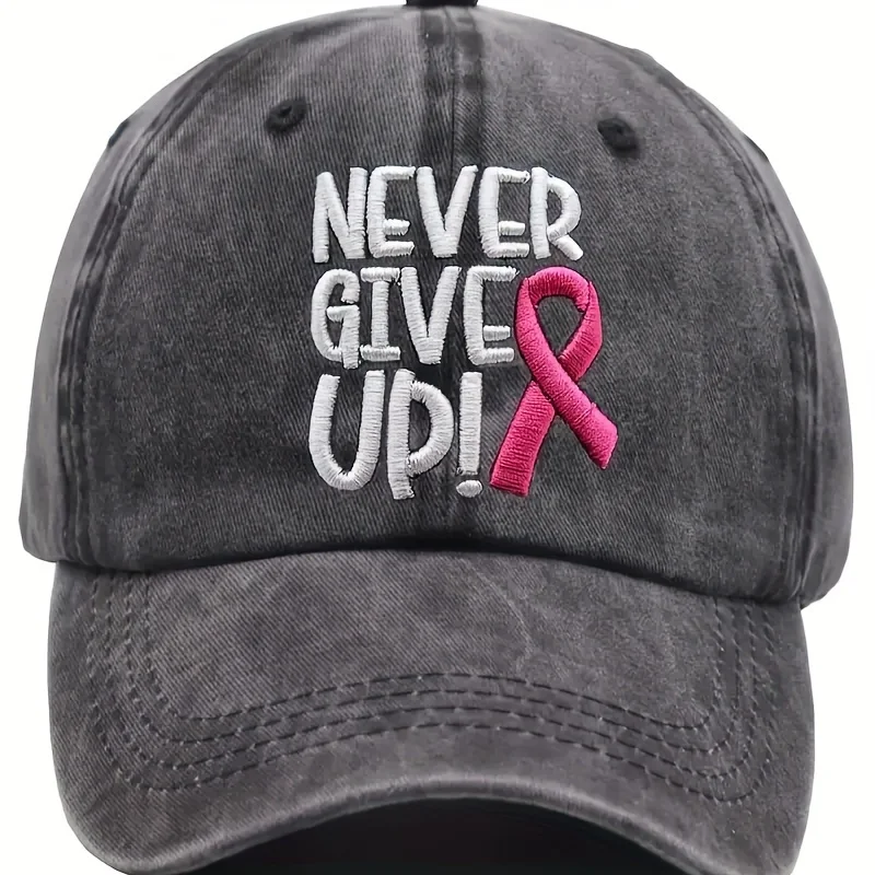 

A Pink Ribbon Embroidered Baseball Cap That Promotes Breast Cancer Awareness, Featuring a 'Never Give Up' Message, Designed for