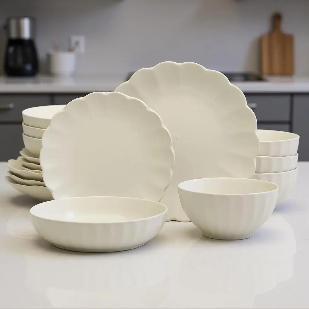 

Набор посуды из 16 предметов из керамики с реактивной глазурью, узор «Ракушка», на 4 персоны – кремово-белый