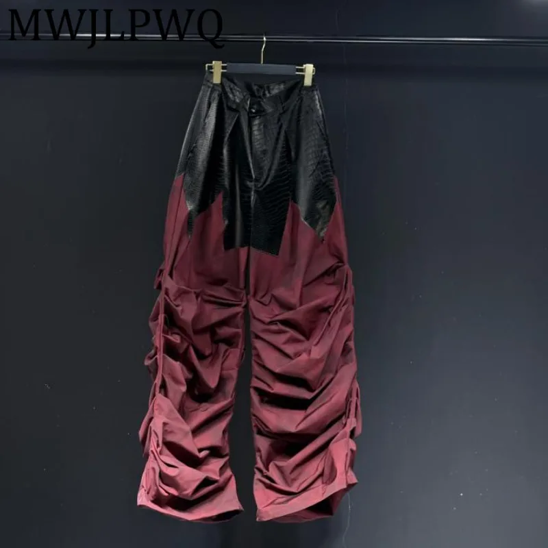 

MWJLPWQ 2025 новые свободные повседневные брюки со складками, мужские повседневные расклешенные брюки из сращенной кожи нестандартной формы 12414
