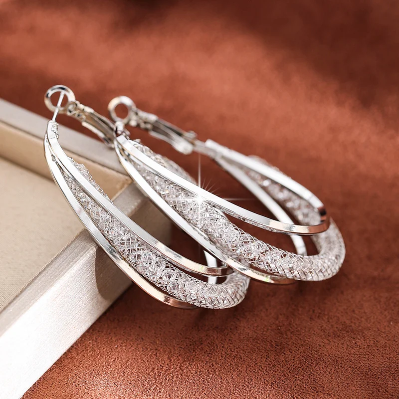 Chic Twisted Silver-Plated Hoop Earrings with Sparkling Zircon Accents - Hypoallergenic, Ideal for Parties & Gifts Best-selling