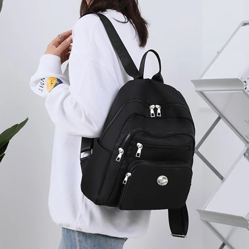 Schwarzbrauner klassischer kleiner Rucksack mit Gittermuster, mehrere Reißverschlusstaschen, lässiger modischer Tagesrucksack für Handy, Kosmetikartikel – Detail 9