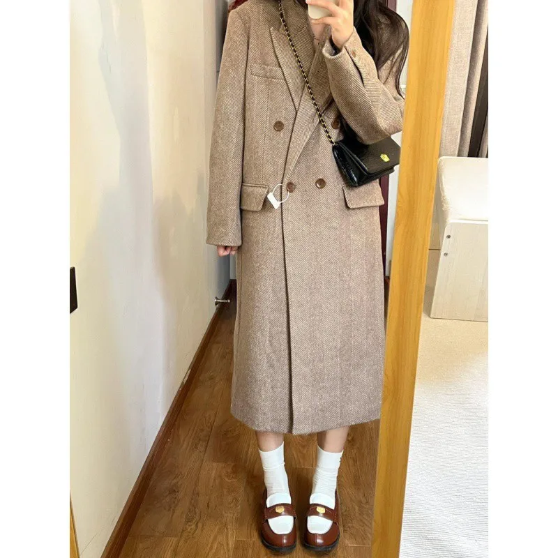 

2023 autumn and winter new Korean shoulder woolen coat femininity design loose medium and long woolen coat