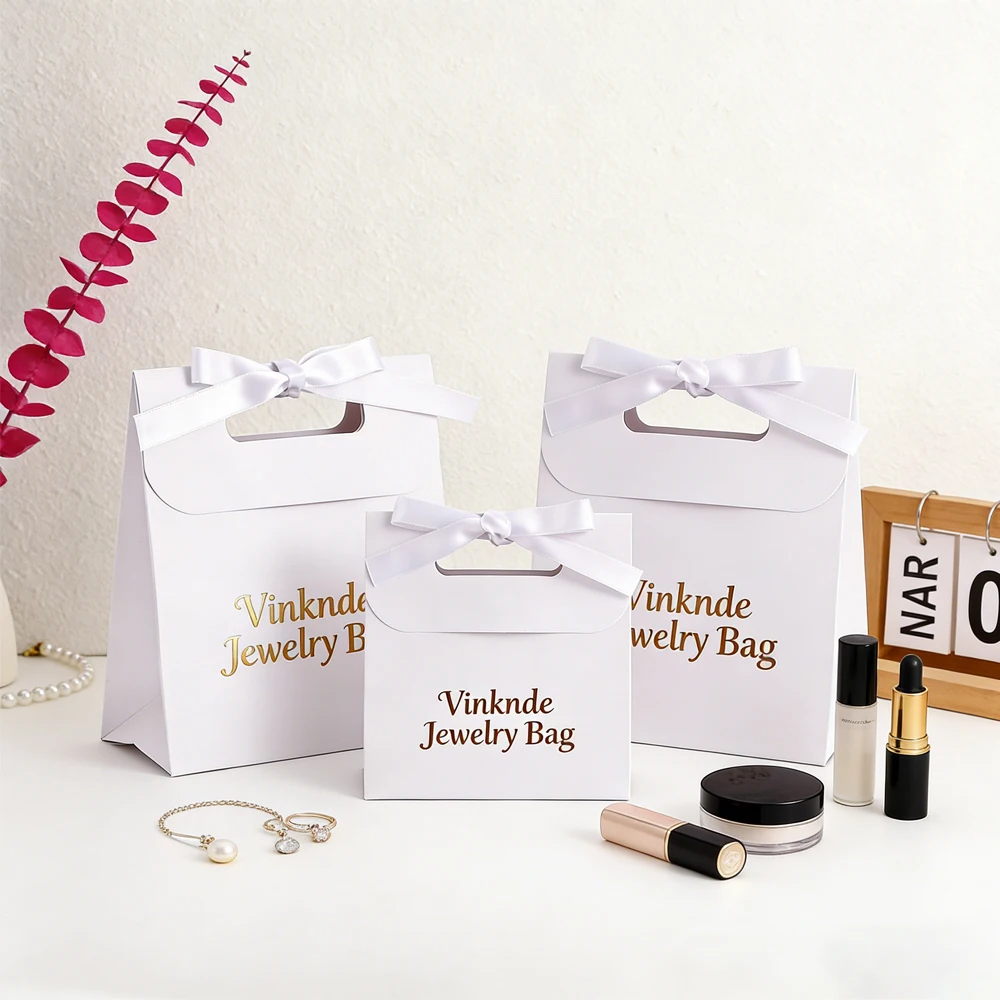 

100 шт. подарочных бумажных пакетов с индивидуальным золотым логотипом и атласной ручкой-бантом, разноцветная роскошная упаковка для ювелирных изделий, подарков, косметики и макияжа