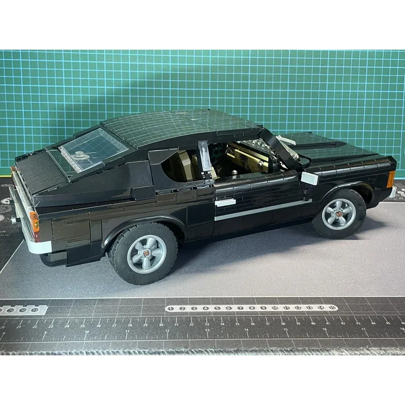 

Конструктор MOC-215795 «Новый город»: Спортивный суперкар 1980-х годов, модель для сборки, 1370 деталей. Игрушка-подарок для мальчиков на День рождения и Рождество.