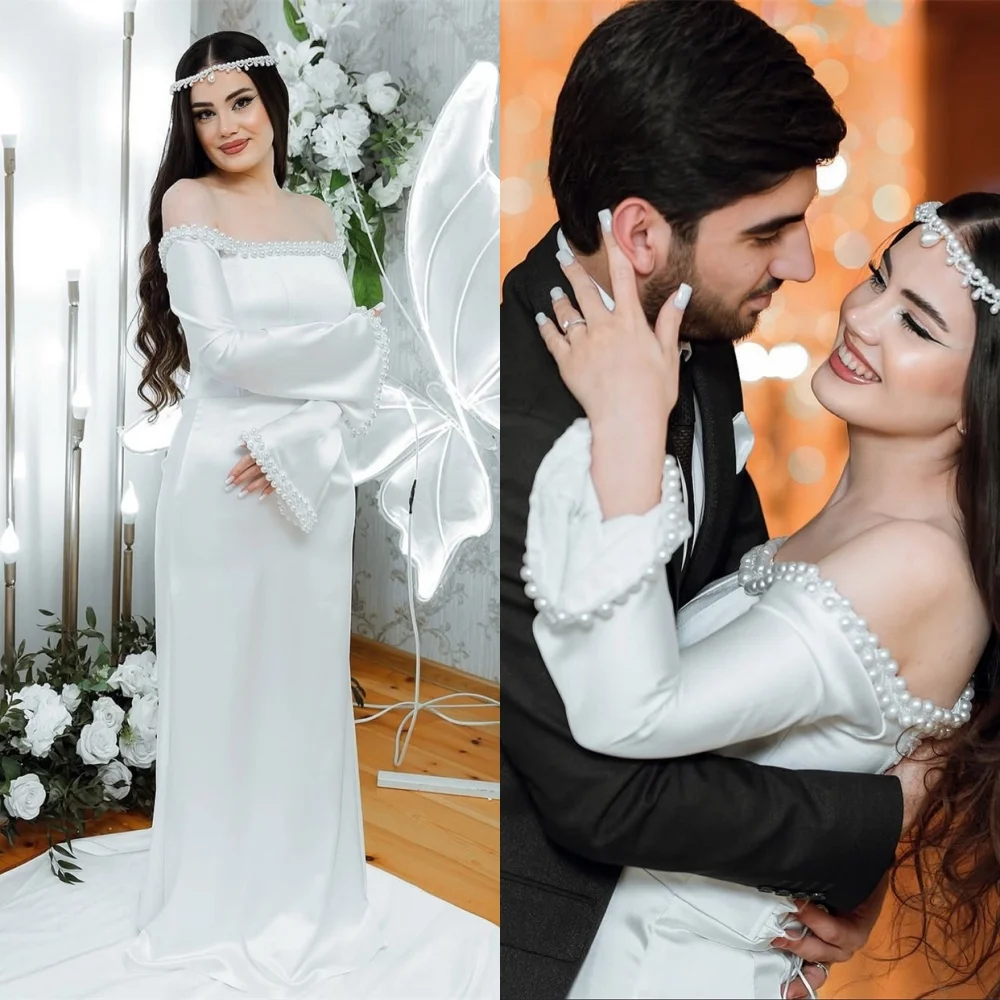 

Customized High Quality White Satin Pearls Wedding Dress Exquisite Boat Neck Long Sleeves Chapel Train Backless Bridal Gowns