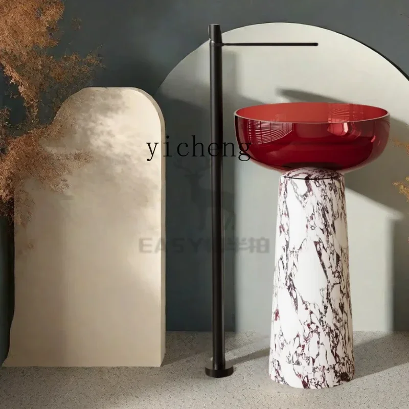 

floor-to-ceiling yellow column basin, transparent resin face wash basin, wash table