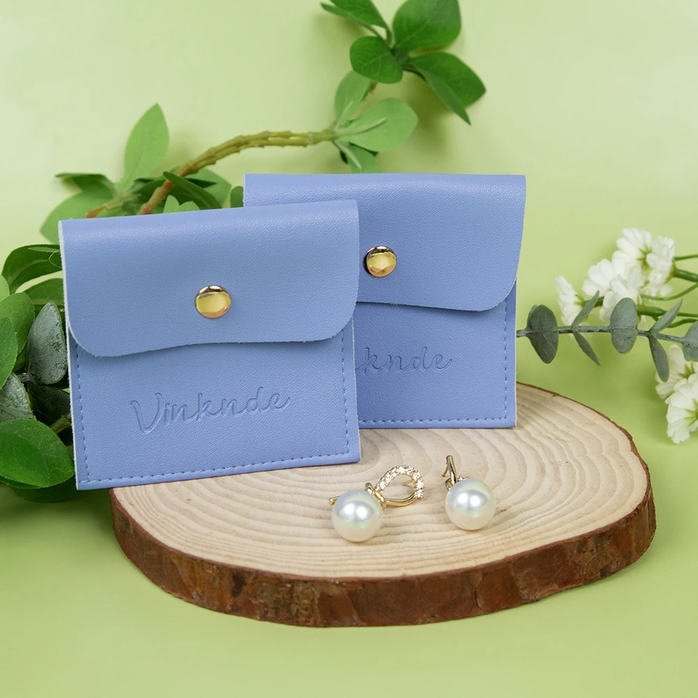 

100 шт. кожаный чехол для ювелирных изделий на заказ с кнопкой 12x12 см, замшевые ювелирные изделия из искусственной кожи, серьги, кольца, ожерелье, сумка для макияжа, часов с логотипом