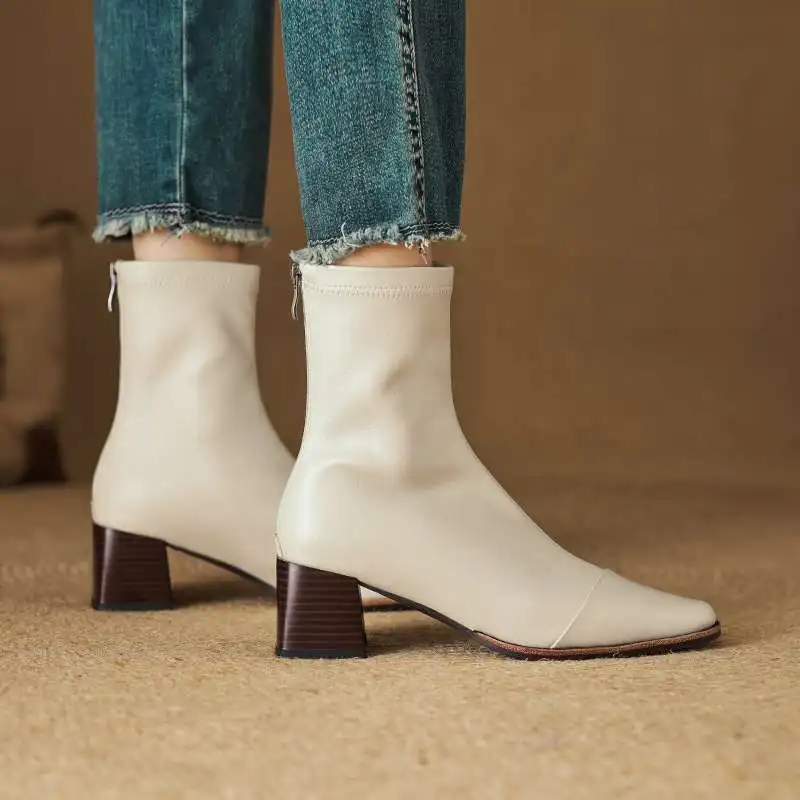 2026 البقرة انقسام الجلد سميكة عالية الكعب الأحذية الموضة الحديثة أحذية الشتاء الخريف الدافئة يؤرخ سستة العلامة التجارية النساء مطاطا حذاء من الجلد