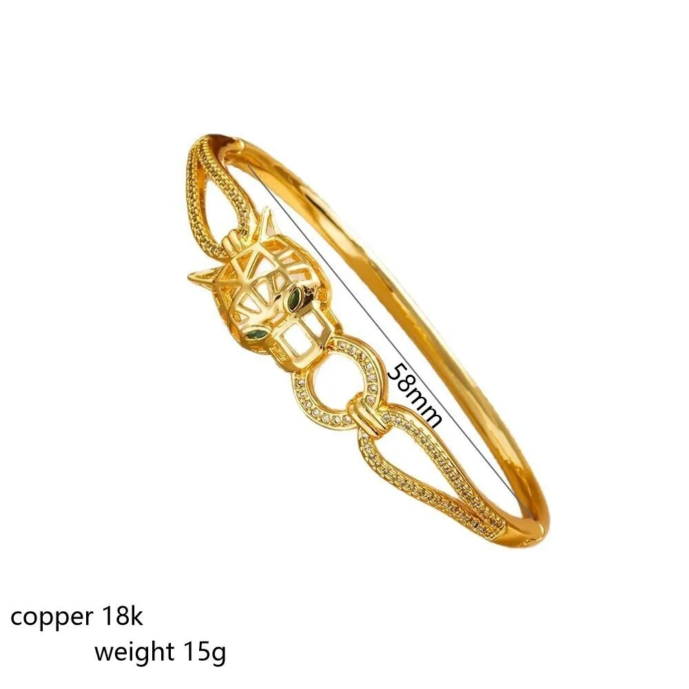 The classic high-end hollowed-out double cheetah head biting ring zircon bracelet exudes a powerful female animal vibe