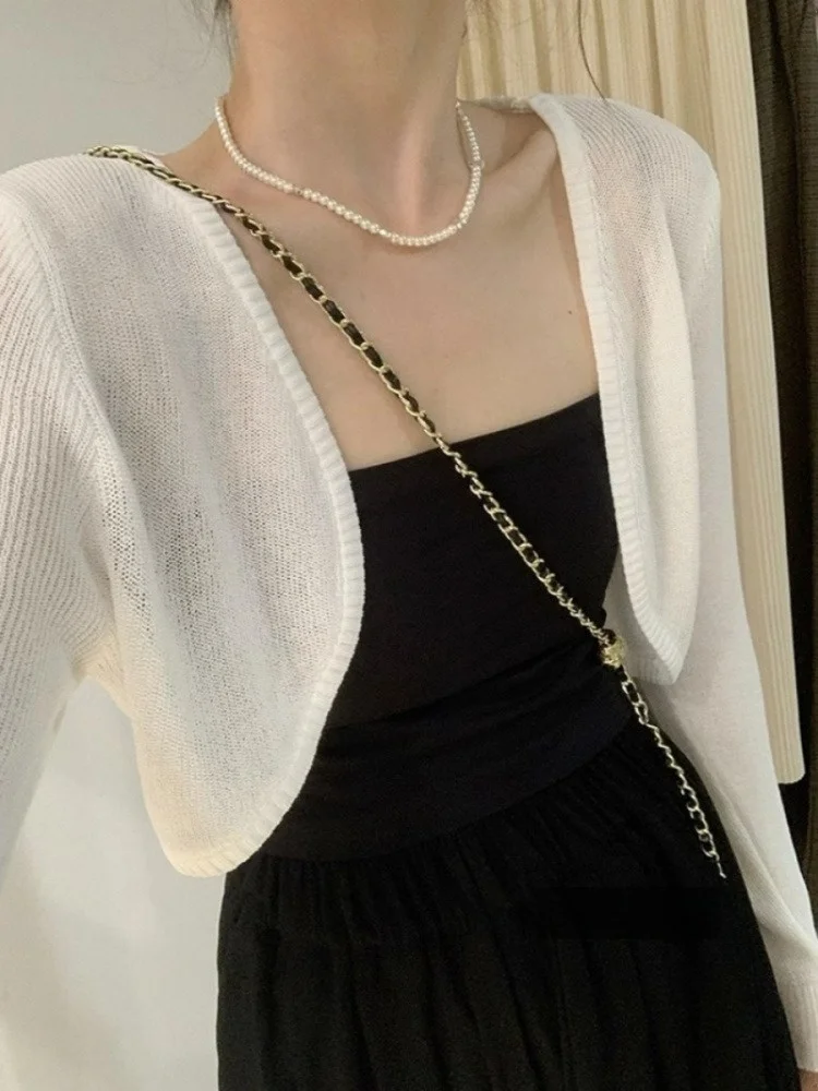 

Белый вязаный кардиган из ледяного шелка. Маленький шил. Женский ор-топ. Летний топ с кондиционером. Повседневный свободный крой. Длинный свеч.