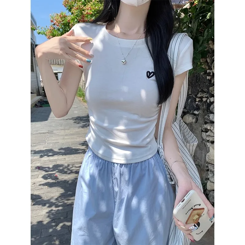 T-Shirt d'été à manches courtes, couleur unie, col rond, Anti-âge, épaules, taille plissée, broderie, coupe cintrée