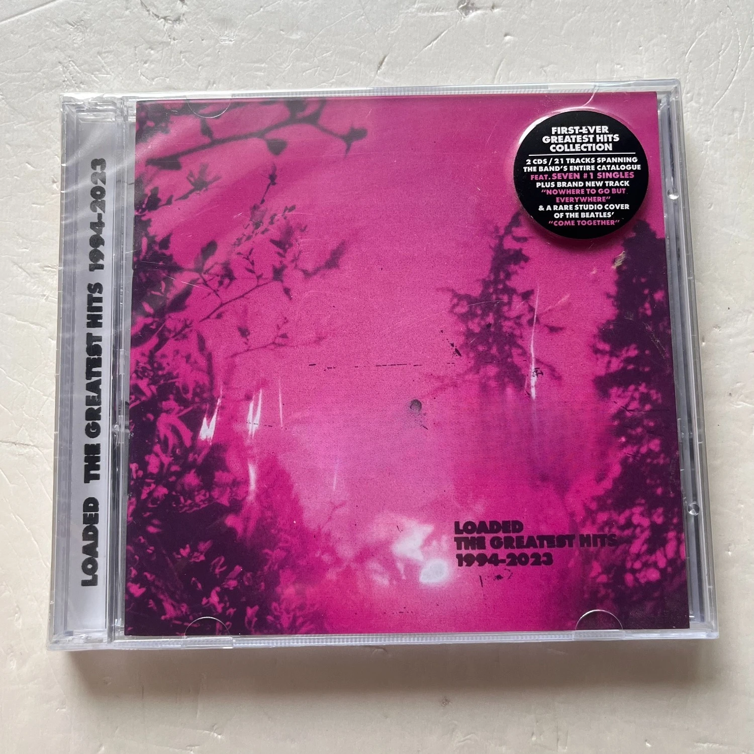 

Alternative Rock Greatest Hits Audio CD Vibrant Magenta Jungle Silhouette Art Cover 90s British Grunge Collectible Disc