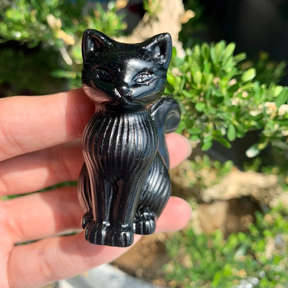 Hand-carved artificial crystal cat sculpture - suitable for home and office decoration. Made of artificial crystal