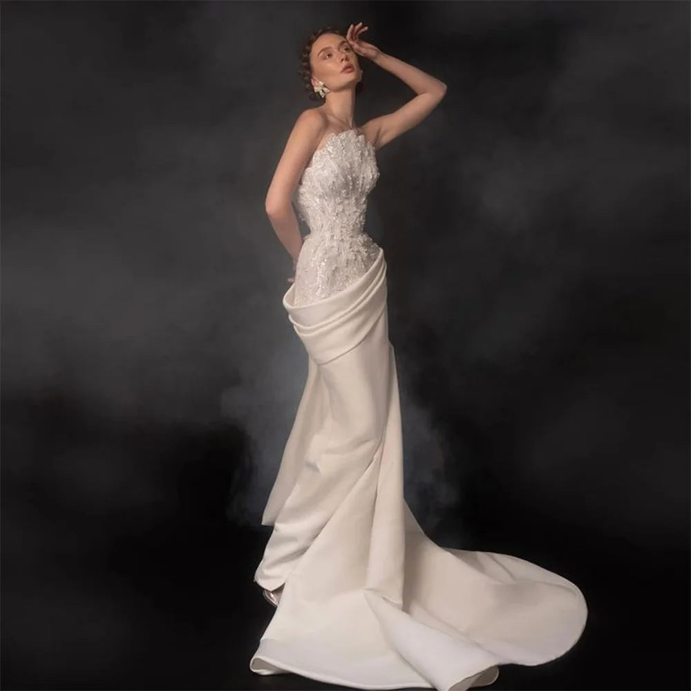 White Lace Beads Applique Strapless Mermaid Bridal Gown With Draped Train Irregular Neck And Big Bow Skirt